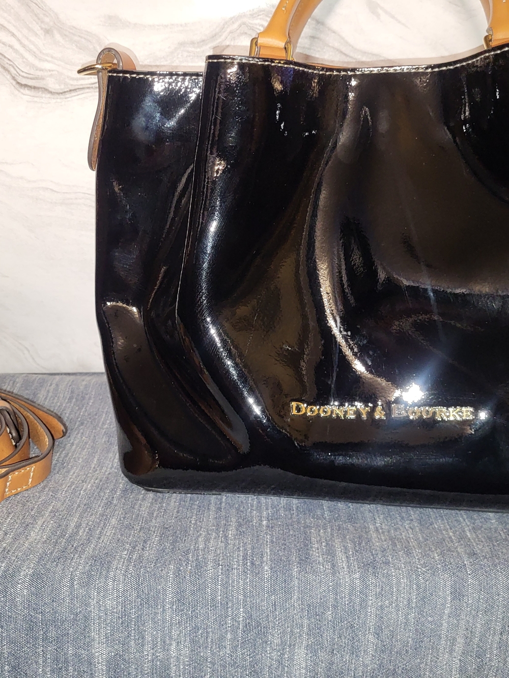 Dooney & Bourke Black Patent Tote with Tan Handles and Gold Logo